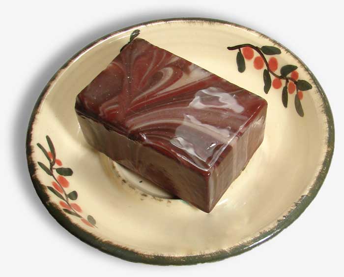 Rum Raisin Soap shown on a Stoneware Soap Dish